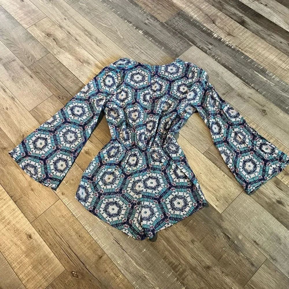 Lulus All in Orbit Teal Print Long Sleeve
Romper